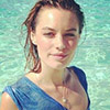 Victoria Secret swimsuit model Camille Row wearing feathered soul jewelry in Turqs and Caicos photo shoot